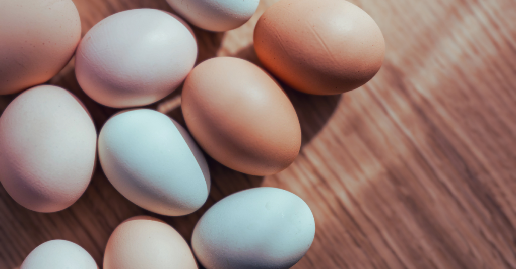 Protein After 30 food source featuring fresh eggs arranged on a table, providing essential nutrients for muscle maintenance and fat loss.