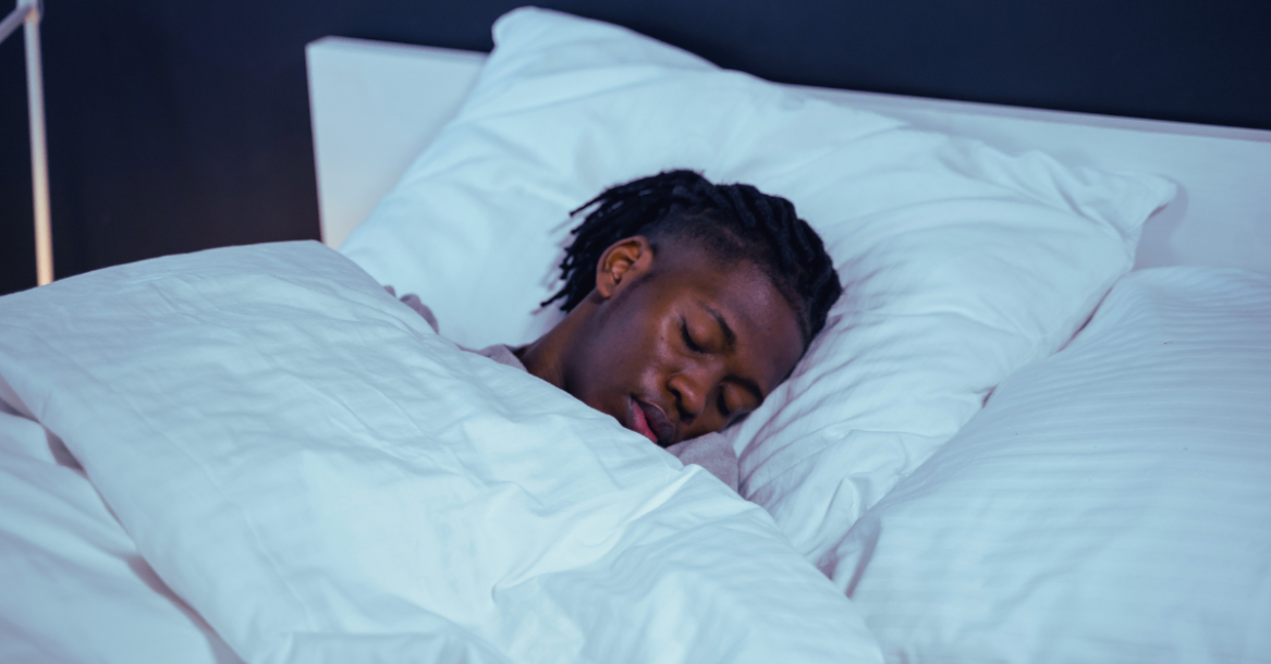Sleep After 30 showing a black woman sleeping peacefully in bed to support recovery, energy restoration, and healthy weight management.