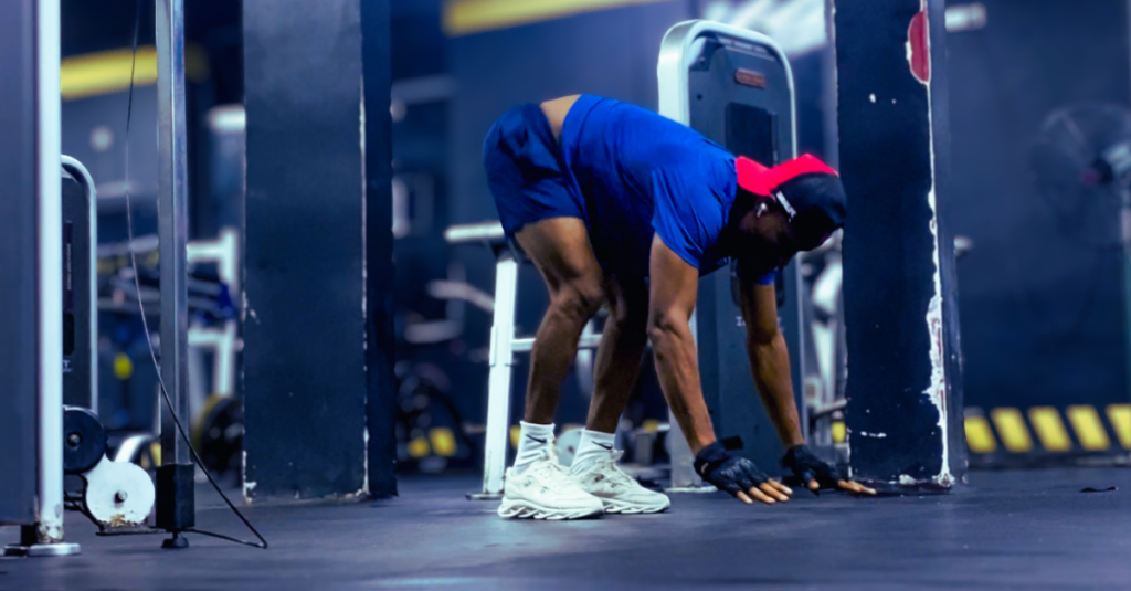 Anthony about to perform burpees as part of his workout routine, demonstrating strength training exercise after 30. Keyword: How Often Should You Strength Train After 30?