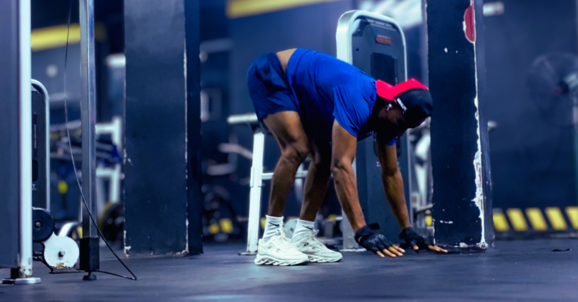 Anthony preparing to perform burpees during a workout, highlighting the importance of avoiding common strength training mistakes after 30.
