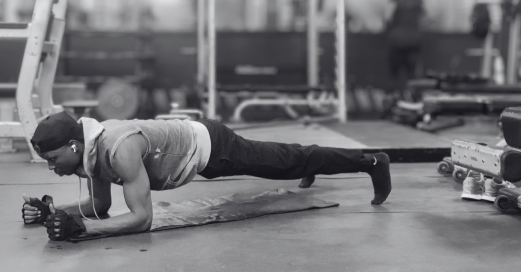 Anthony holding a plank position as part of How to Build Muscle at Home After 30, a bodyweight exercise that strengthens the core and improves stability.