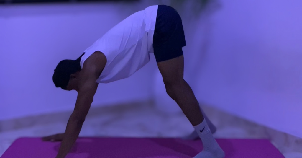 Anthony preparing to perform a burpee during home workouts for weight loss after 30, getting ready for a full-body exercise that boosts calorie burn and fitness.