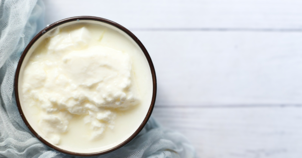 Bowl of Greek yogurt, one of the high-calorie foods that provides protein, healthy fats, and nutrients to support healthy weight gain.