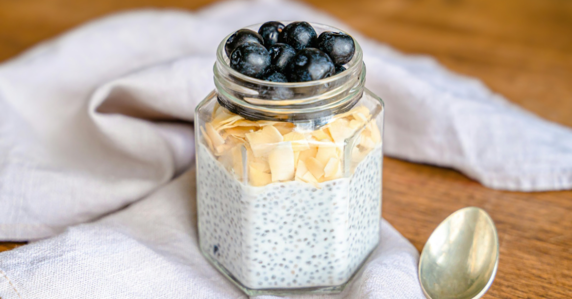 Jar of chia seed pudding topped with fresh berries, representing a healthy low-carb breakfast option for weight management and sustained energy.