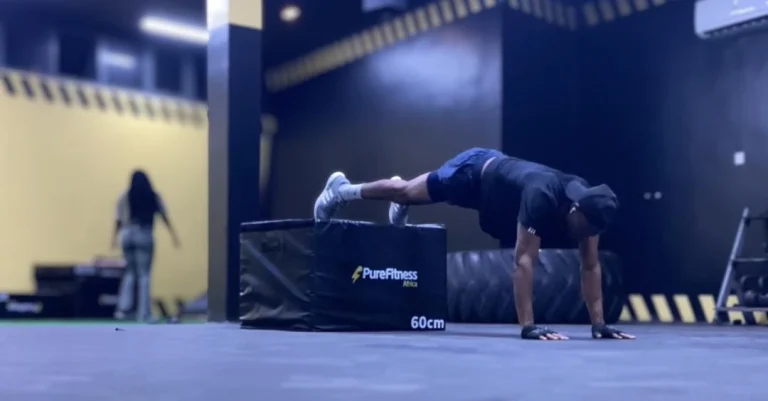 Anthony performing elevated push-ups with his feet on a box as part of Fitness Lessons After 30.