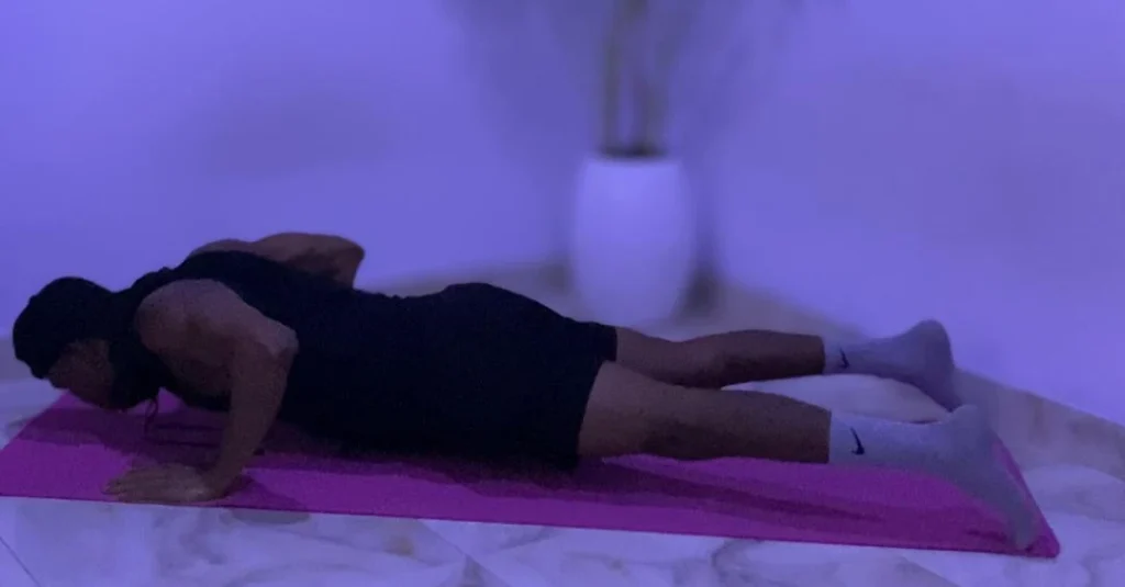 Home Workouts After 30: Anthony performing push-ups at home to build upper-body strength and endurance.