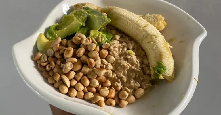 Nutrition After 30: A bowl of overnight oats topped with groundnuts, banana, and avocado for a balanced and nutritious breakfast.