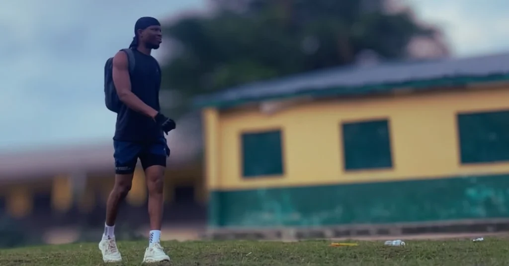 Anthony preparing to start a workout in an open field during my fitness journey after 30