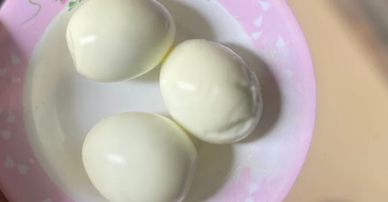 Anthony holding a bowl of three boiled eggs while discussing my protein mistakes after 30
