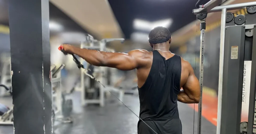Mannilawani performing a cable lateral raise