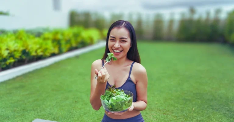 Woman enjoying a healthy, balanced meal as part of healthy eating habits after 30.