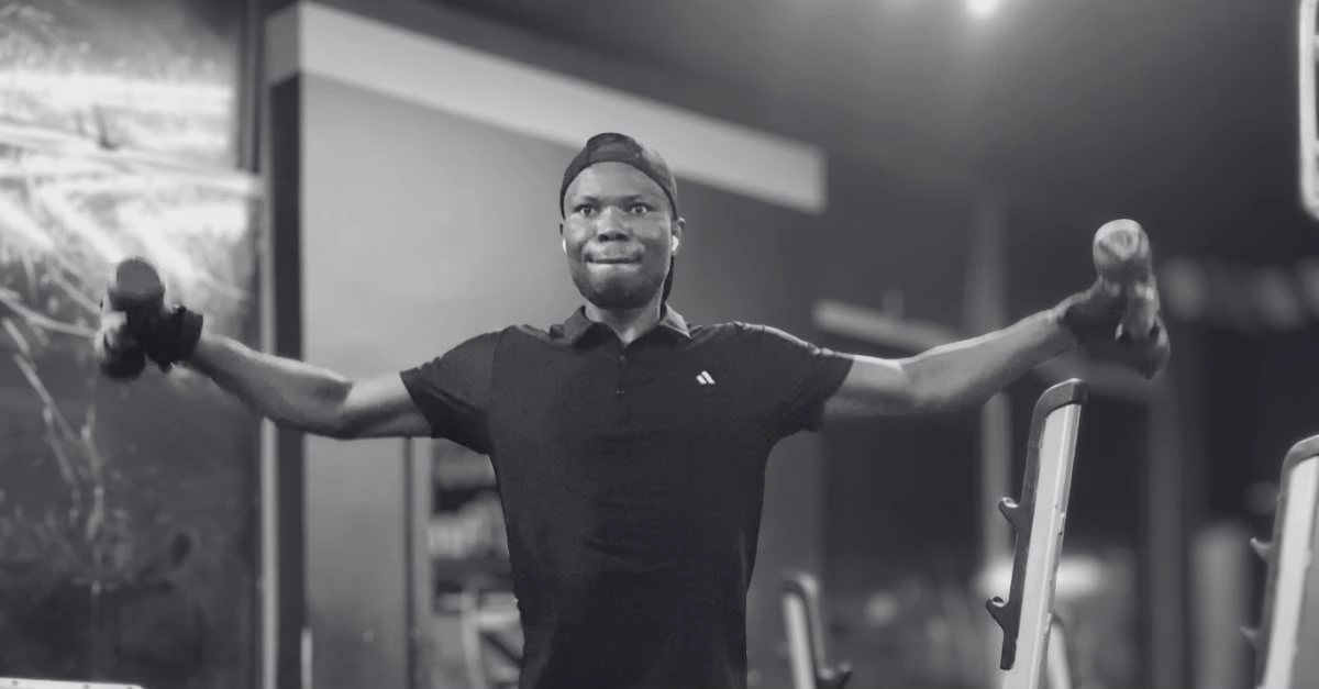 Anthony is performing dumbbell lateral raises with proper form to strengthen the side deltoid muscles after 30
