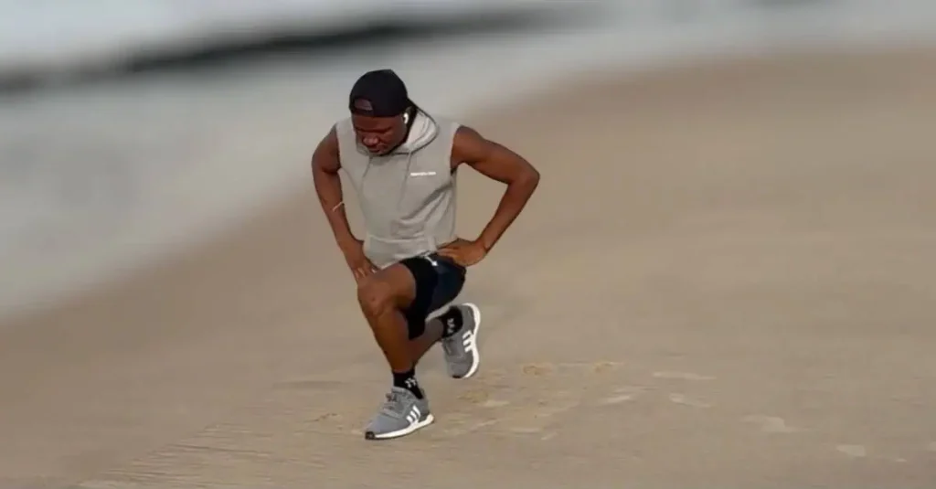 Anthony demonstrating how to do jump lunges from a front view